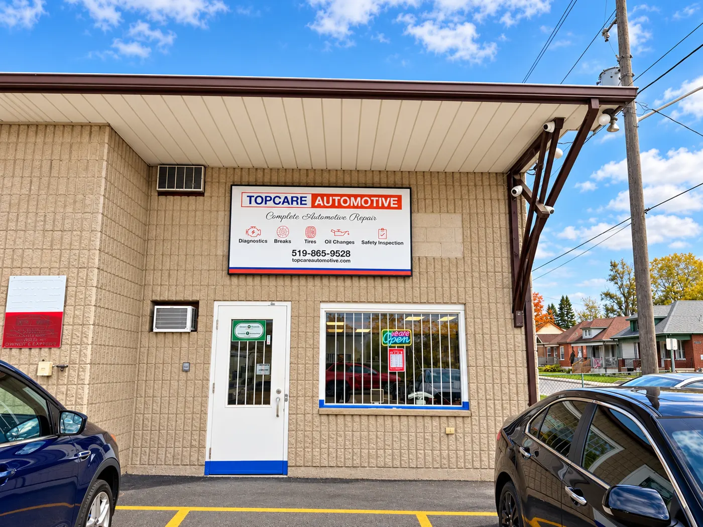 Topcare Automotive customer entrance and shop sign at 291 Rawdon St, Brantford